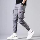 Calça Cargo Masculina 2025 – Casual, Solta, Vários Bolsos e Cós Elástico