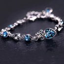 Pulseira da Sorte com Coração em Cristal Azul  – LUMINA