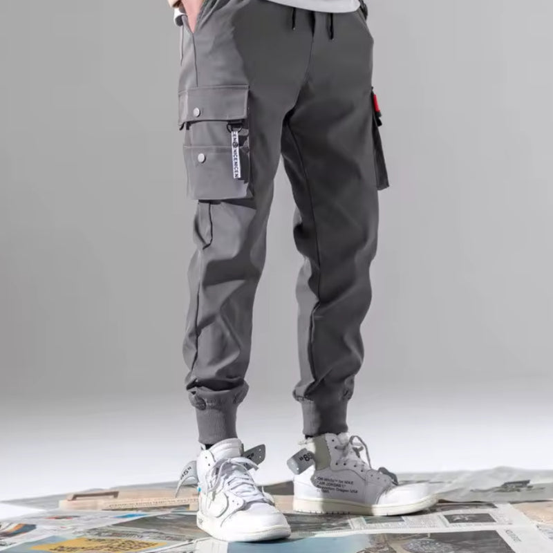 Calça Cargo Masculina 2025 – Casual, Solta, Vários Bolsos e Cós Elástico