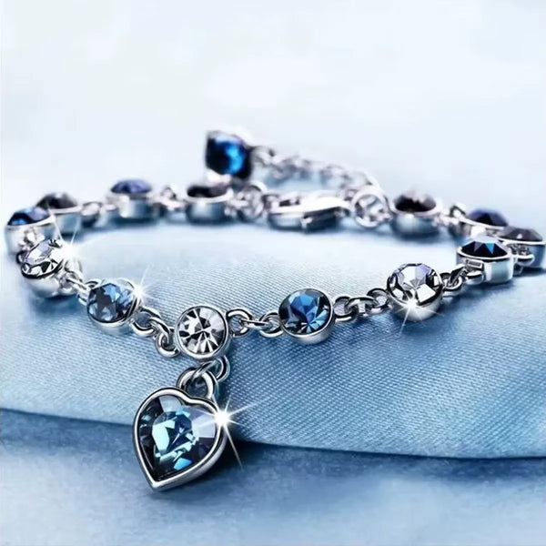 Pulseira da Sorte com Coração em Cristal Azul  – LUMINA